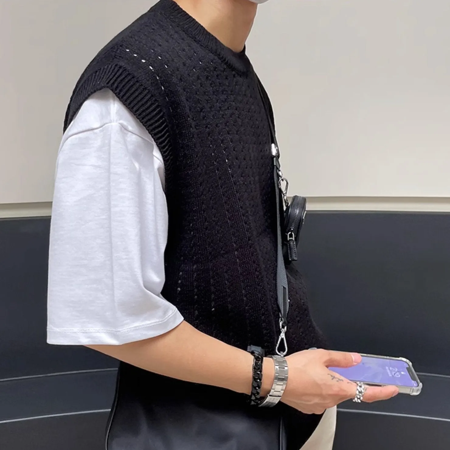 KNITTED SLEEVELESS VEST