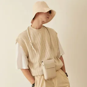 KNITTED SLEEVELESS VEST