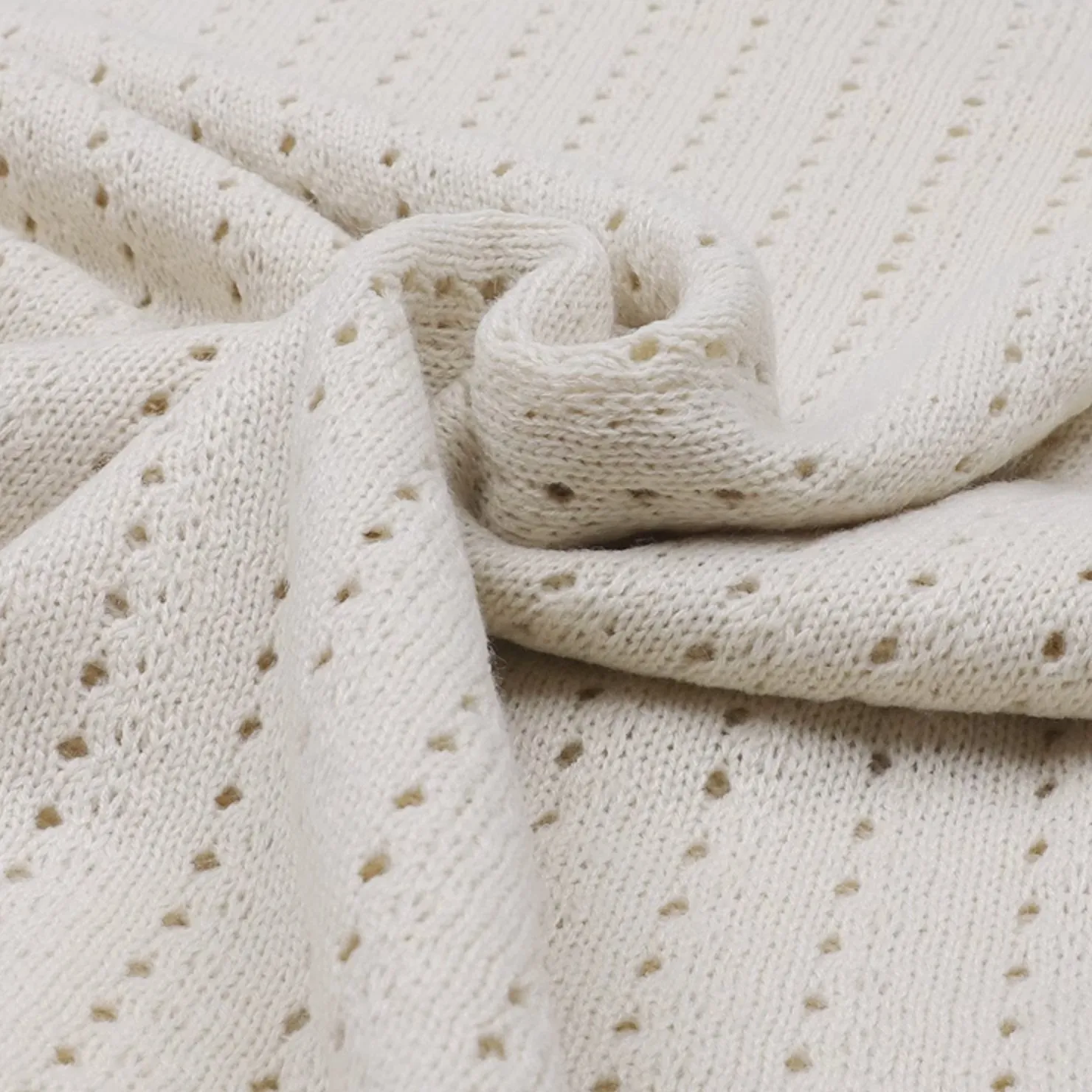 KNITTED SLEEVELESS VEST